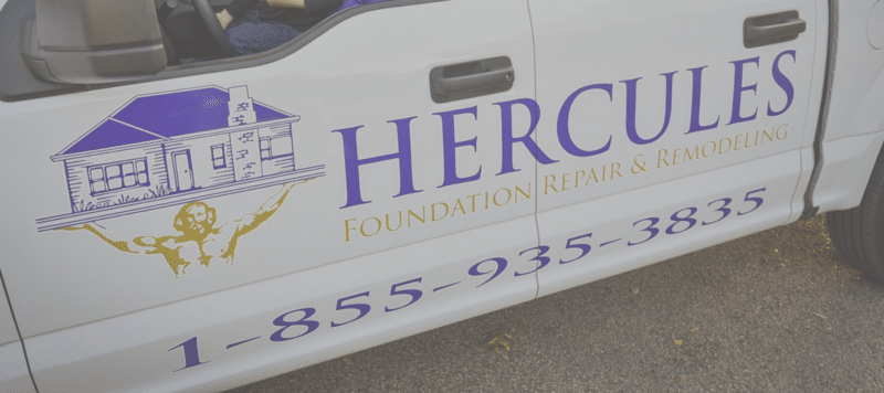 blue and gold hercules branding on the side of a white truck door