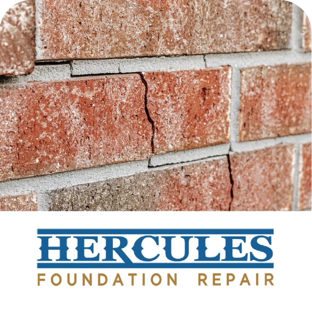 Close-up of cracked brick mortar above the Hercules Foundation Repair logo